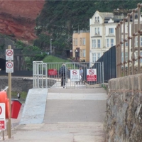 Ignorant cyclist, Dawlish sea wall after new signs and barrier go up!