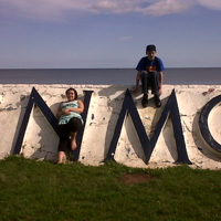 Brother and Sister on the Teignmouth Sign