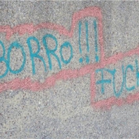 Graffiti on the sea wall - Teignmouth...caution abusive word on display!!!!