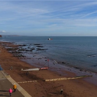 Dredger at work Teignmouth sea front 13 Nov 2016.