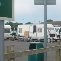 Travellers on the Football Club Car Park
