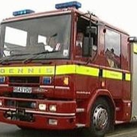 Road-accident-traps-woman-25254